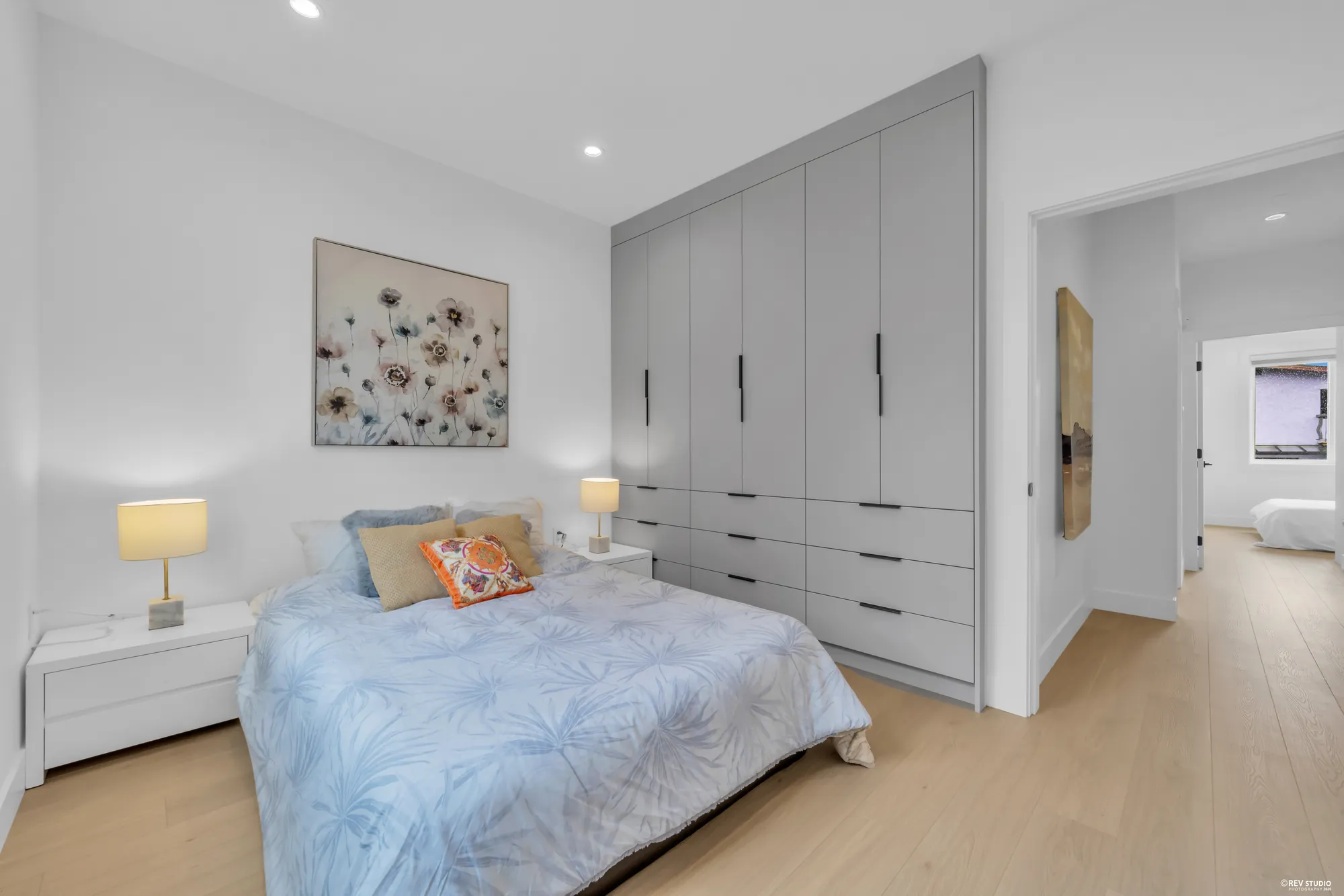 The third bedroom from the doorway, showing its wardrobe